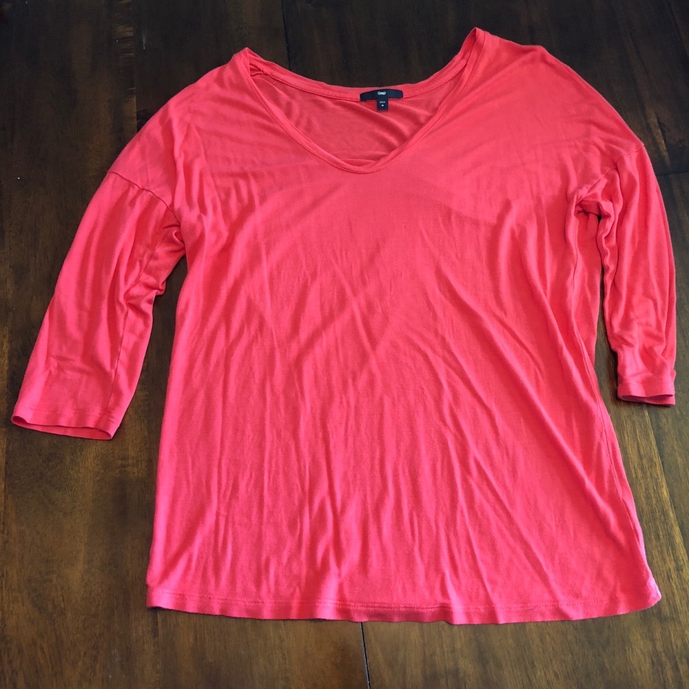 Bright pink dolman sleeved top